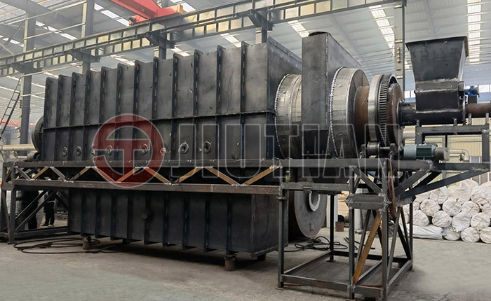 What is a continuous carbonization furnace?